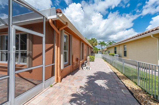 1001 SW 189th Ave, Pembroke Pines, FL 33029 - view of property exterior featuring a fenced backyard, stucco siding, and a patio