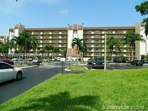 3100 W Rolling Hills Cir Unit 101, Davie, FL 33328 - view of apartment building / complex