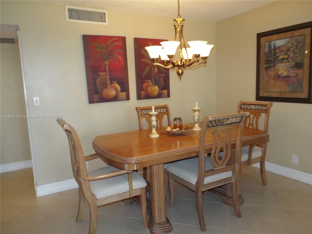1890 S Ocean Dr Unit 504, Hallandale Beach, FL 33009 - tiled dining area featuring a chandelier and baseboards
