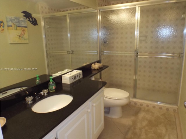 1890 S Ocean Dr Unit 504, Hallandale Beach, FL 33009 - bathroom featuring vanity, a shower stall, and tile patterned flooring