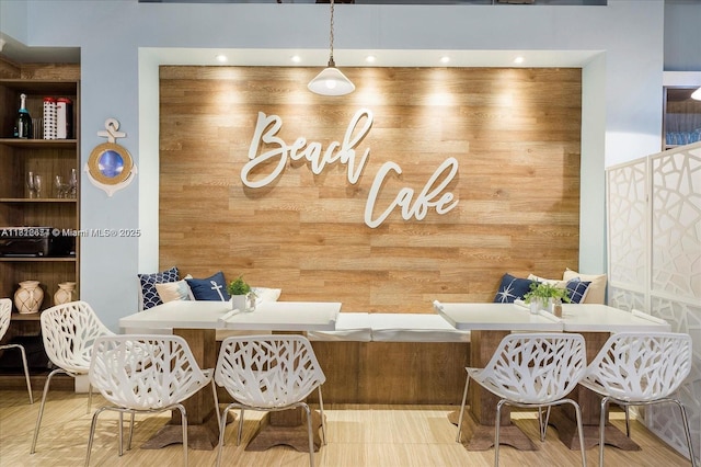 10275 Collins Ave Unit 330, Bal Harbour, FL 33154 - dining room with wooden walls, breakfast area, and recessed lighting