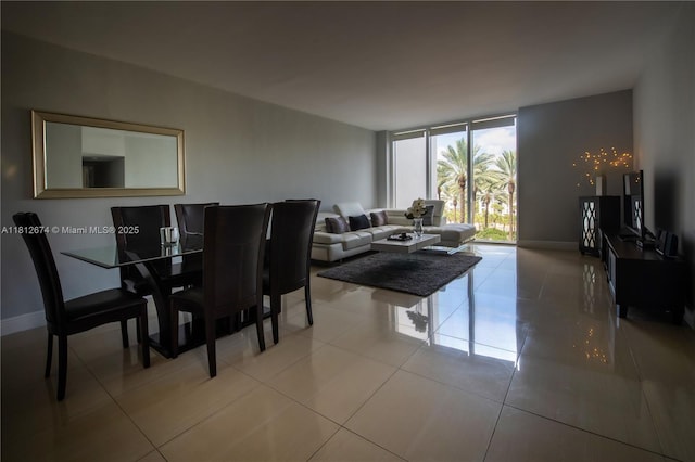 10275 Collins Ave Unit 330, Bal Harbour, FL 33154 - dining area featuring floor to ceiling windows and tile patterned flooring