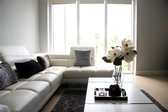 10275 Collins Ave Unit 330, Bal Harbour, FL 33154 - living room featuring tile patterned flooring