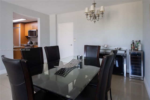10275 Collins Ave Unit 330, Bal Harbour, FL 33154 - tiled dining room with wine cooler, a chandelier, and a dry bar