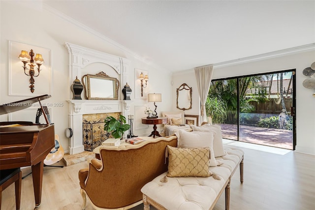 20045 NW 65th Ct, Hialeah, FL 33015 - living area featuring crown molding, light wood finished floors, a fireplace, and lofted ceiling