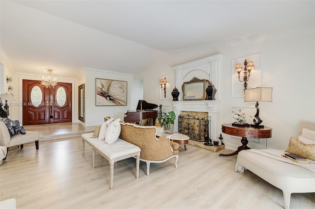 20045 NW 65th Ct, Hialeah, FL 33015 - living room with a chandelier, light wood-type flooring, crown molding, a fireplace with raised hearth, and vaulted ceiling