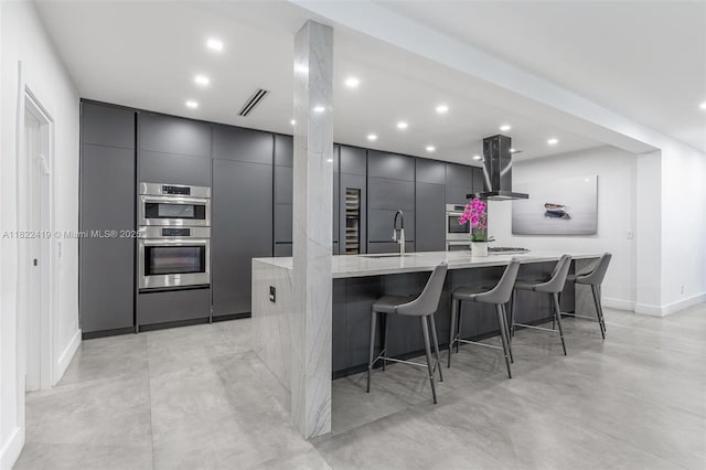 1331 97th St, Bay Harbor Islands, FL 33154 - kitchen featuring modern cabinets, exhaust hood, double oven, concrete floors, and recessed lighting