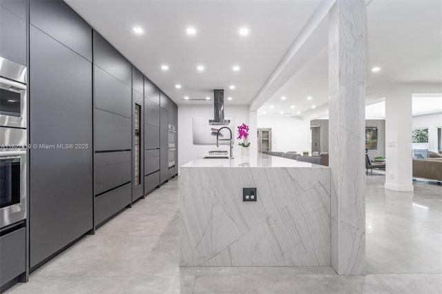 1331 97th St, Bay Harbor Islands, FL 33154 - kitchen with modern cabinets, light stone counters, open floor plan, a spacious island, and recessed lighting