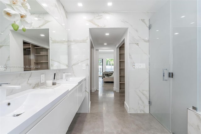 1331 97th St, Bay Harbor Islands, FL 33154 - bathroom with double vanity, finished concrete flooring, and a marble finish shower