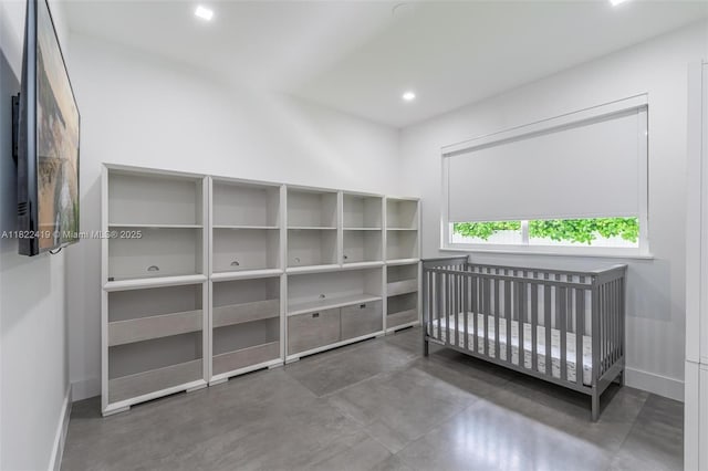1331 97th St, Bay Harbor Islands, FL 33154 - unfurnished bedroom featuring finished concrete floors, recessed lighting, and a crib