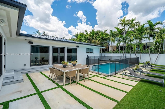 1331 97th St, Bay Harbor Islands, FL 33154 - view of swimming pool featuring a patio and french doors