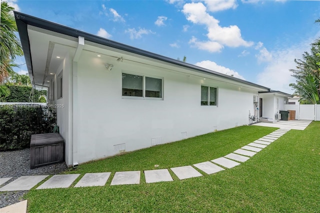 1331 97th St, Bay Harbor Islands, FL 33154 - back of house featuring stucco siding