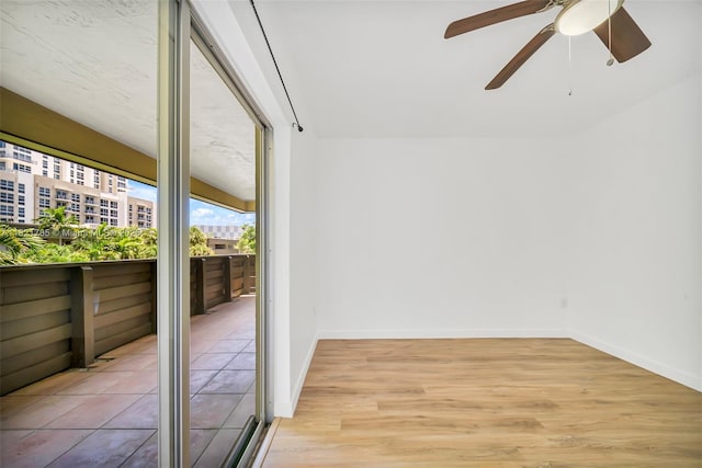 8335 SW 72nd Ave Unit 315D, Miami, FL 33143 - unfurnished sunroom with a ceiling fan