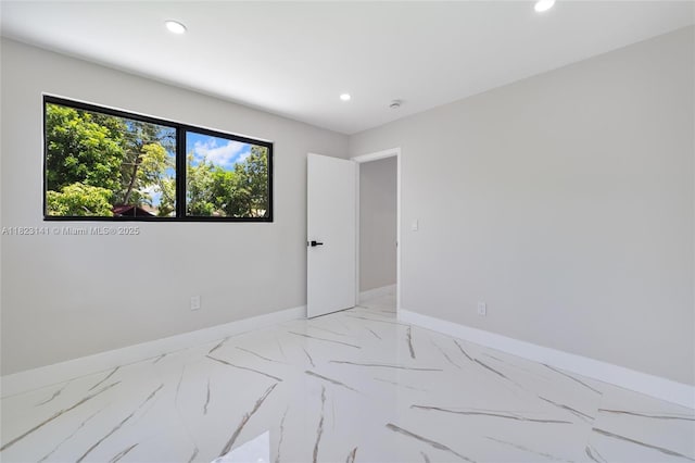 4300 Monroe St, Hollywood, FL 33021 - spare room with recessed lighting, light marble finish flooring, and a smoke detector