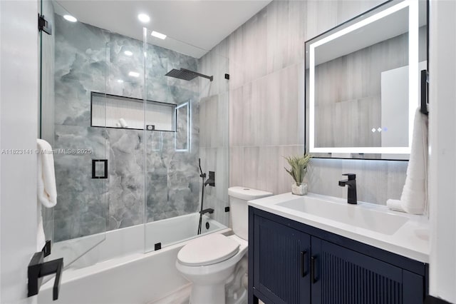4300 Monroe St, Hollywood, FL 33021 - bathroom with vanity, bath / shower combo with glass door, and tile walls