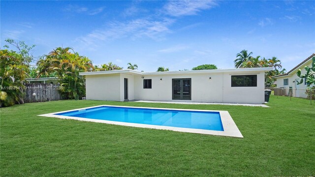 4300 Monroe St, Hollywood, FL 33021 - rear view of house with french doors and stucco siding