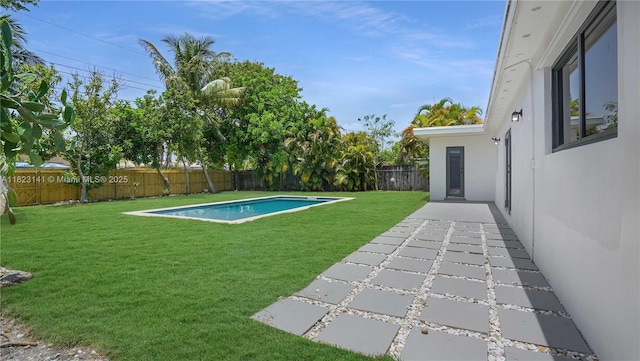 4300 Monroe St, Hollywood, FL 33021 - fenced backyard with a patio area
