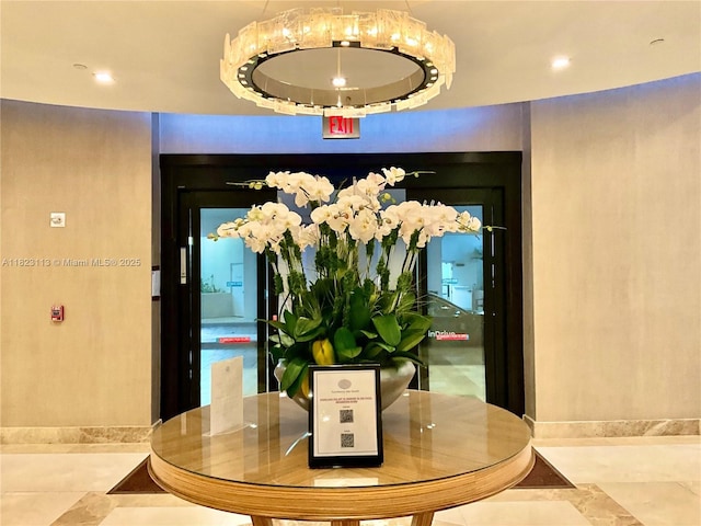 19667 Turnberry Way Unit 20B, Aventura, FL 33180 - detailed view of a chandelier and recessed lighting