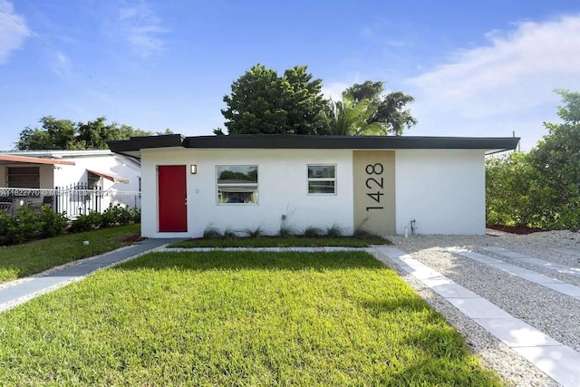 1428 NE 153rd Ter, North Miami Beach, FL 33162 - view of front facade featuring stucco siding