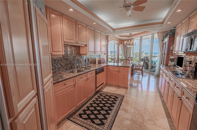 6051 N Ocean Dr Unit 704, Hollywood, FL 33019 - kitchen featuring black electric cooktop, a tray ceiling, stainless steel microwave, dishwashing machine, and decorative backsplash