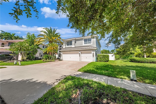 2631 SW 180th Ave, Miramar, FL 33029 - view of front of house featuring a garage, driveway, a front yard, and a metal roof