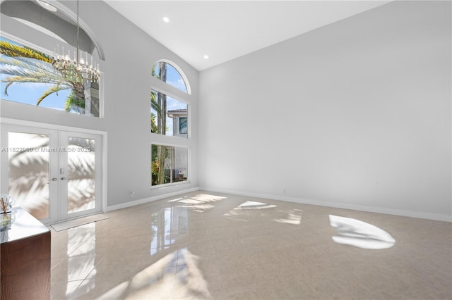 2631 SW 180th Ave, Miramar, FL 33029 - empty room with high vaulted ceiling, french doors, and recessed lighting