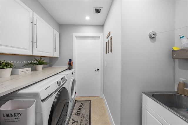 2631 SW 180th Ave, Miramar, FL 33029 - washroom featuring cabinet space, washer and clothes dryer, recessed lighting, and light tile patterned flooring