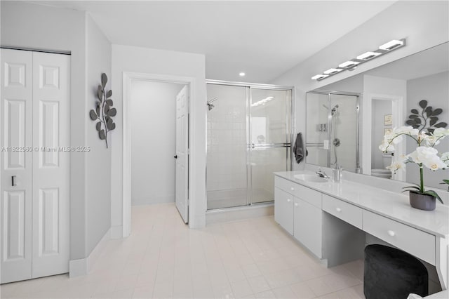 2631 SW 180th Ave, Miramar, FL 33029 - full bathroom featuring a stall shower, vanity, recessed lighting, tile patterned floors, and a closet