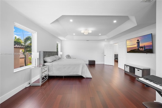 2631 SW 180th Ave, Miramar, FL 33029 - bedroom with a tray ceiling, wood finished floors, and recessed lighting