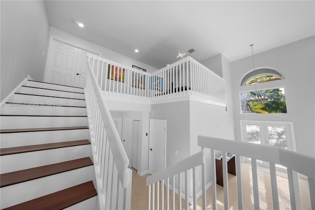 2631 SW 180th Ave, Miramar, FL 33029 - stairway featuring a high ceiling, a chandelier, and recessed lighting