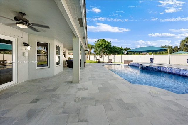 2631 SW 180th Ave, Miramar, FL 33029 - view of swimming pool featuring ceiling fan, a fenced backyard, a patio area, and a pool with connected hot tub