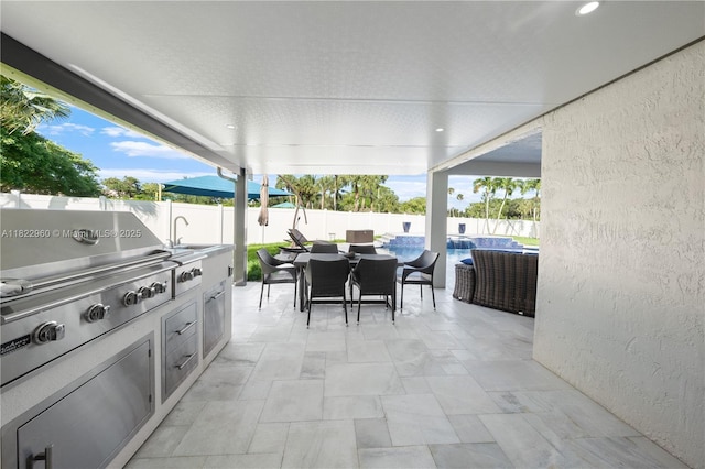 2631 SW 180th Ave, Miramar, FL 33029 - fenced backyard featuring outdoor dining area, a patio, and area for grilling