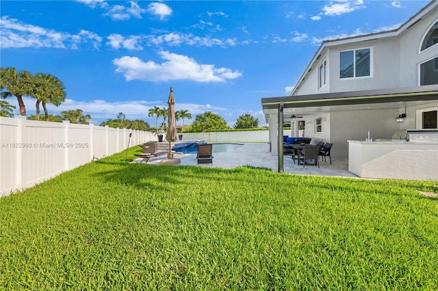 2631 SW 180th Ave, Miramar, FL 33029 - fenced backyard with ceiling fan and a patio area