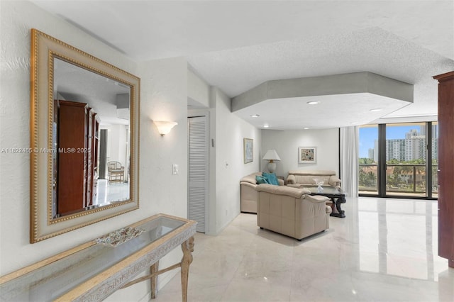 19667 Turnberry Way Unit 6-A, Aventura, FL 33180 - living area featuring light marble finish floors