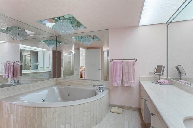 19667 Turnberry Way Unit 6-A, Aventura, FL 33180 - full bath with a shower stall, a tub with jets, and vanity