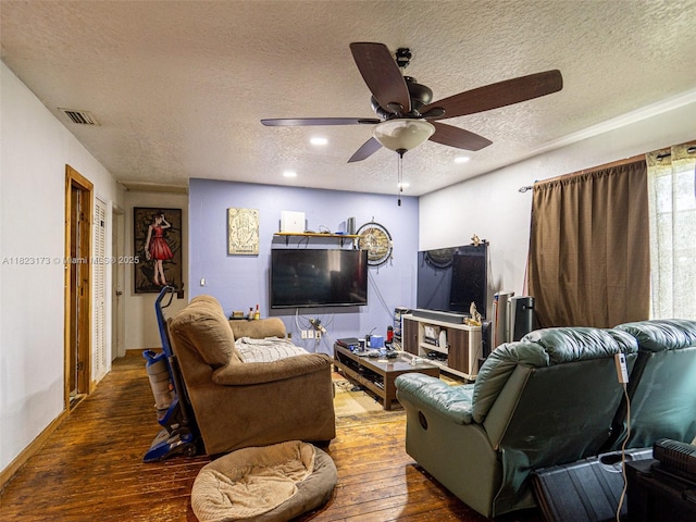 907 S Amelia Ave, Deltona, FL 32724 - living room featuring a textured ceiling, ceiling fan, hardwood / wood-style floors, and recessed lighting