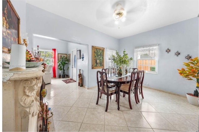 611 E 48th St, Hialeah, FL 33013 - dining area with a ceiling fan and light tile patterned floors