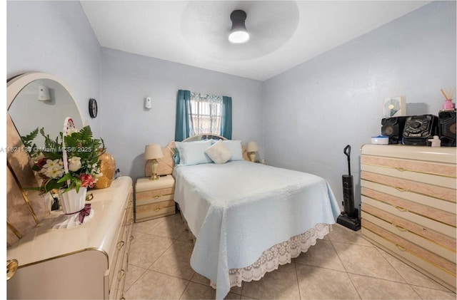 611 E 48th St, Hialeah, FL 33013 - bedroom with light tile patterned floors and a ceiling fan