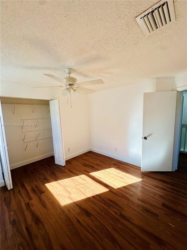 18961 NW 22nd St, Pembroke Pines, FL 33029 - unfurnished bedroom featuring a textured ceiling, wood finished floors, a ceiling fan, and a closet