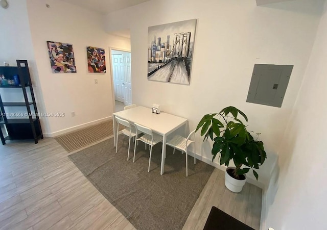 275 NE 18th St Unit 402, Miami, FL 33132 - dining room with electric panel and wood finished floors