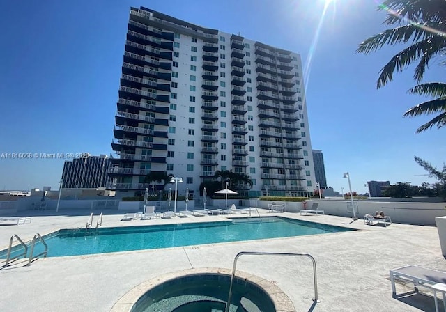 275 NE 18th St Unit 402, Miami, FL 33132 - community pool featuring a patio and a community hot tub