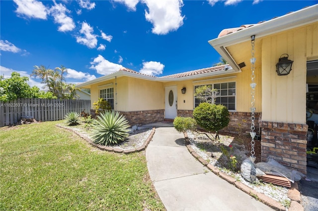 11351 NW 37th St, Coral Springs, FL 33065 - property entrance featuring a tile roof and brick siding
