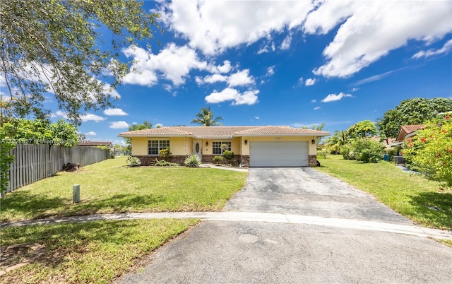 11351 NW 37th St, Coral Springs, FL 33065 - ranch-style house with stucco siding, driveway, a tile roof, an attached garage, and stone siding