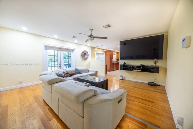 11351 NW 37th St, Coral Springs, FL 33065 - living area with ceiling fan, light wood-style floors, and recessed lighting