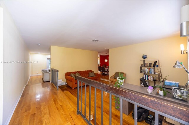 11351 NW 37th St, Coral Springs, FL 33065 - hall with light wood-type flooring and baseboards