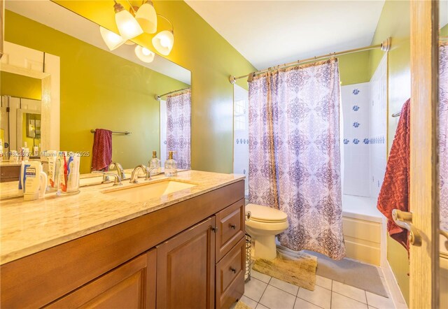 11351 NW 37th St, Coral Springs, FL 33065 - bathroom featuring tile patterned floors, vanity, and shower / bathtub combination with curtain