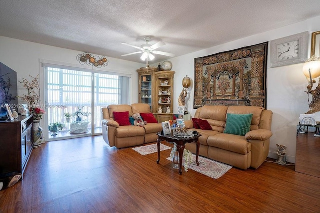 215 SE 3rd Ave Unit 405C, Hallandale Beach, FL 33009 - living room featuring wood finished floors, a textured ceiling, and a ceiling fan