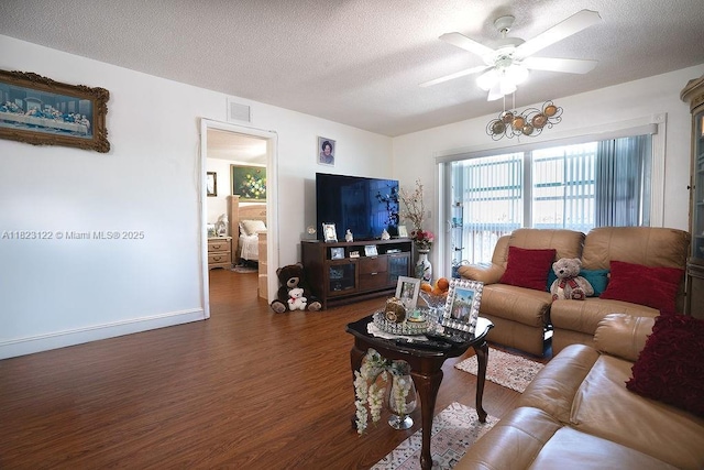 215 SE 3rd Ave Unit 405C, Hallandale Beach, FL 33009 - living area featuring ceiling fan, wood finished floors, and a textured ceiling