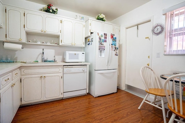 215 SE 3rd Ave Unit 405C, Hallandale Beach, FL 33009 - kitchen featuring white appliances, light countertops, wood finished floors, white cabinets, and open shelves
