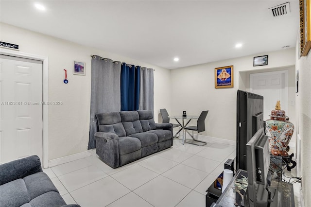 114 Marion Rd, West Park, FL 33023 - tiled living room with recessed lighting and baseboards